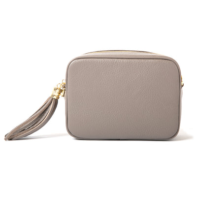 The cinder grey Chichester handbag made from luxurious italian leather with a matching detachable strap and a tassle detail on the zip